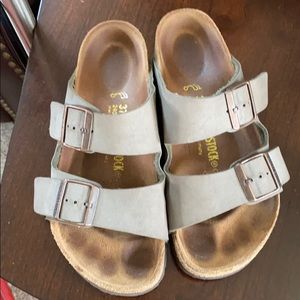 Gray Birkenstock woman’s sandals
